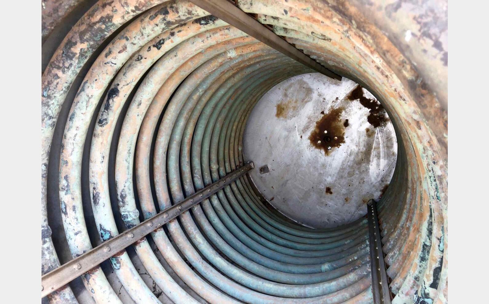 Stainless steel tank with copper coil