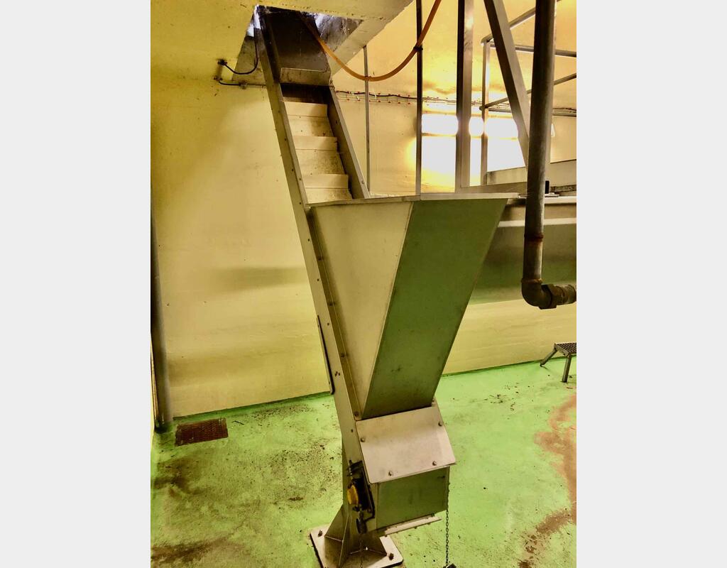 Tapis &eacute;l&eacute;vateur &agrave; tasseaux