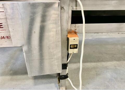 Slatted elevator belt