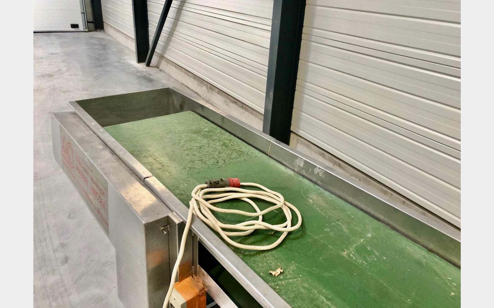 Tapis &eacute;levateur &agrave; tasseaux