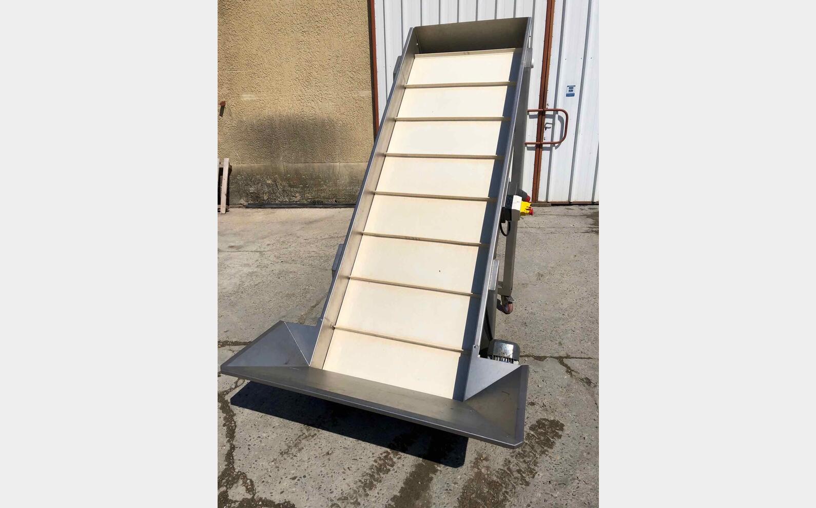 Tapis &eacute;l&eacute;vateur &agrave; Tasseaux